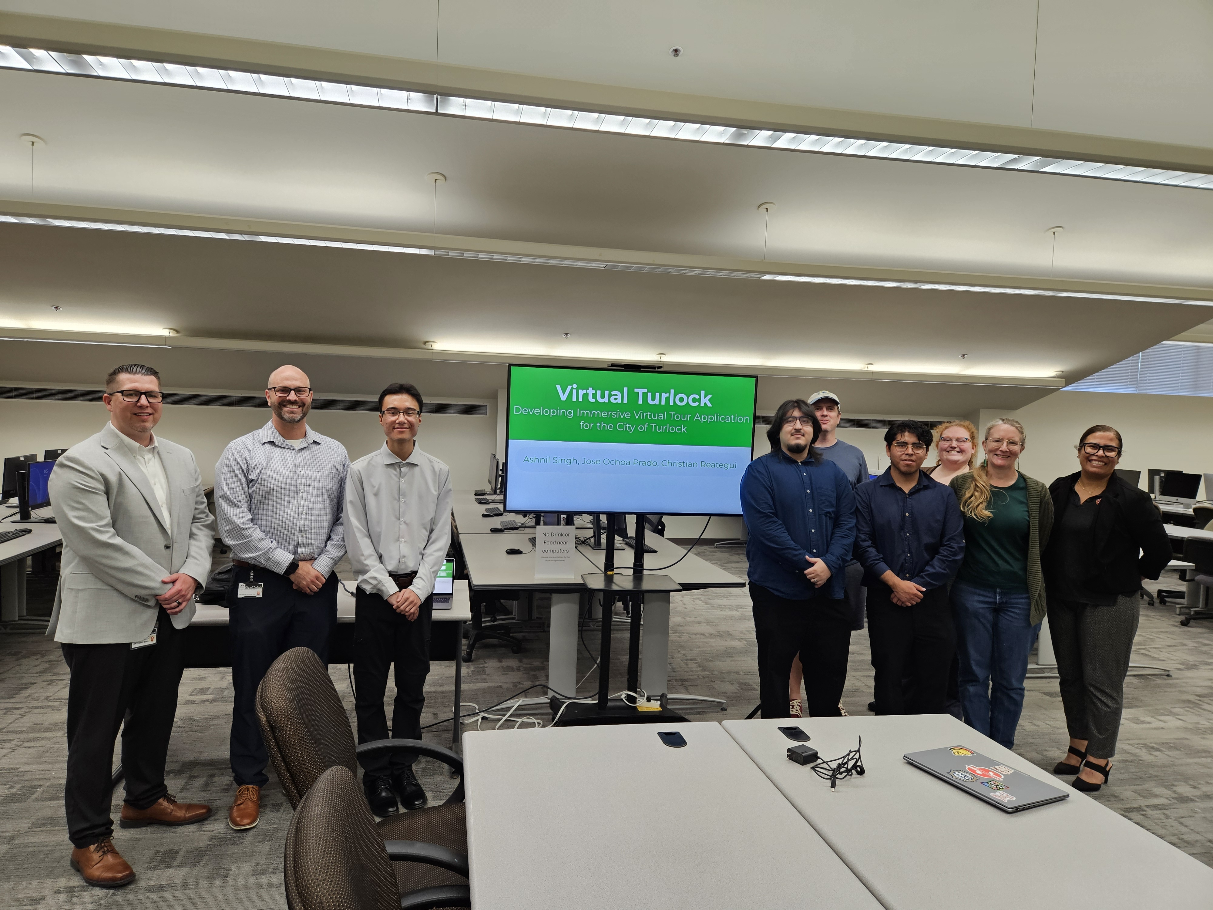 Group Photo in Computer Lab with Monitor